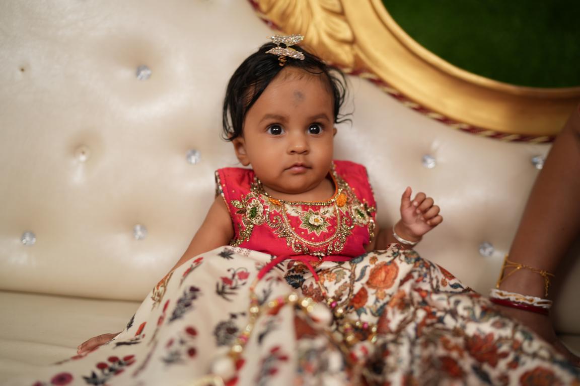 Happy family moments from baby’s annaprasan ceremony in Kolkata by Santanuz Gallery.