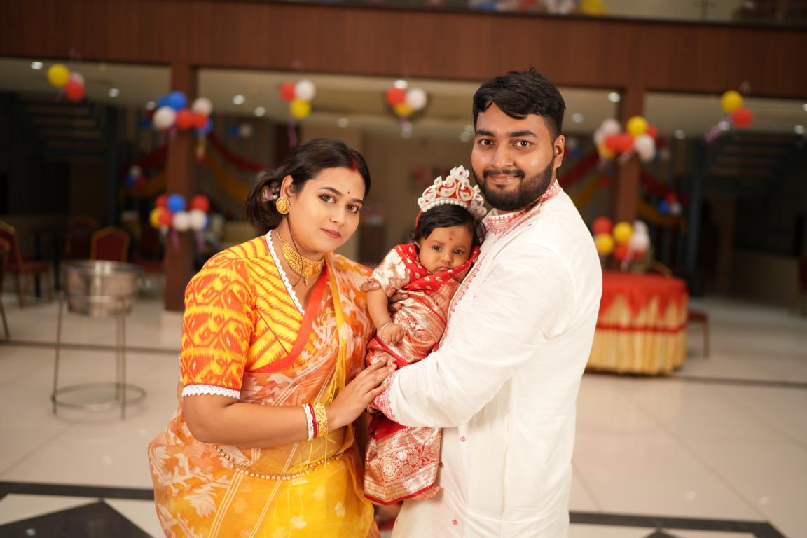 Candid moments from baby’s first rice ceremony in Kolkata by Santanuz Gallery.