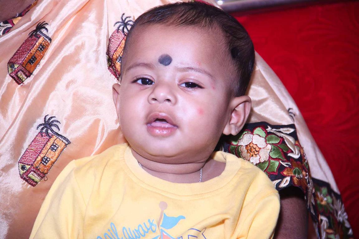 Baby’s first rice ceremony photography in Kolkata by Santanuz Gallery.