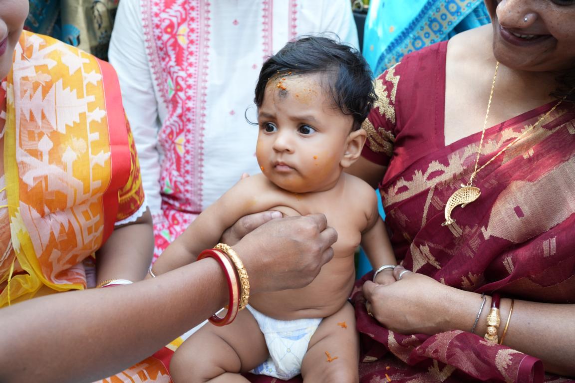 Traditional annaprasan ceremony photography in Kolkata by Santanuz Gallery.