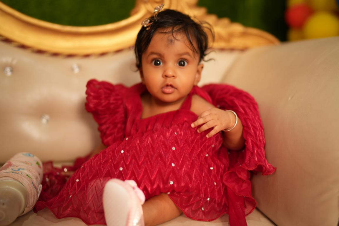 Beautiful annaprasan family moments captured in Kolkata by Santanuz Gallery.