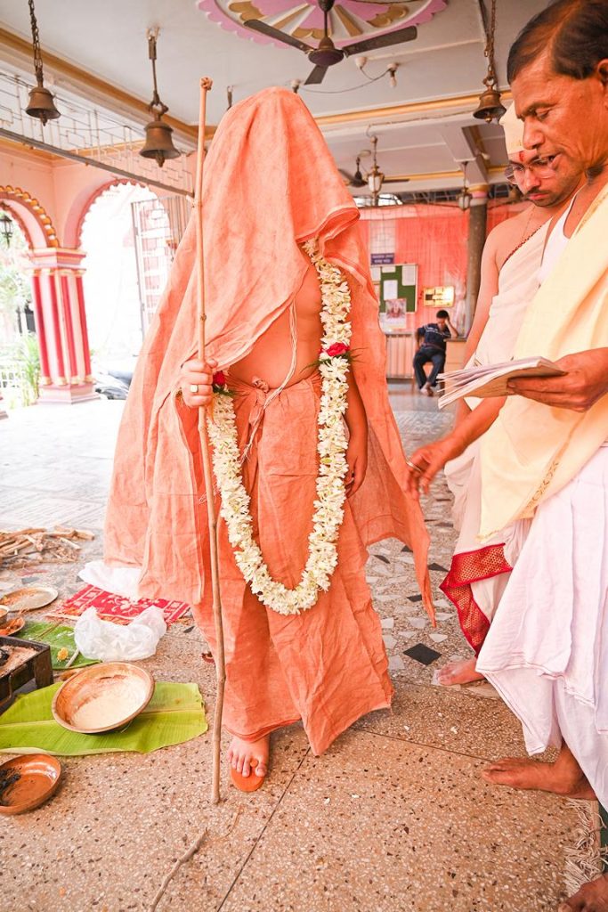 “Uponayan ceremony fire ritual performed by Hindu priest”