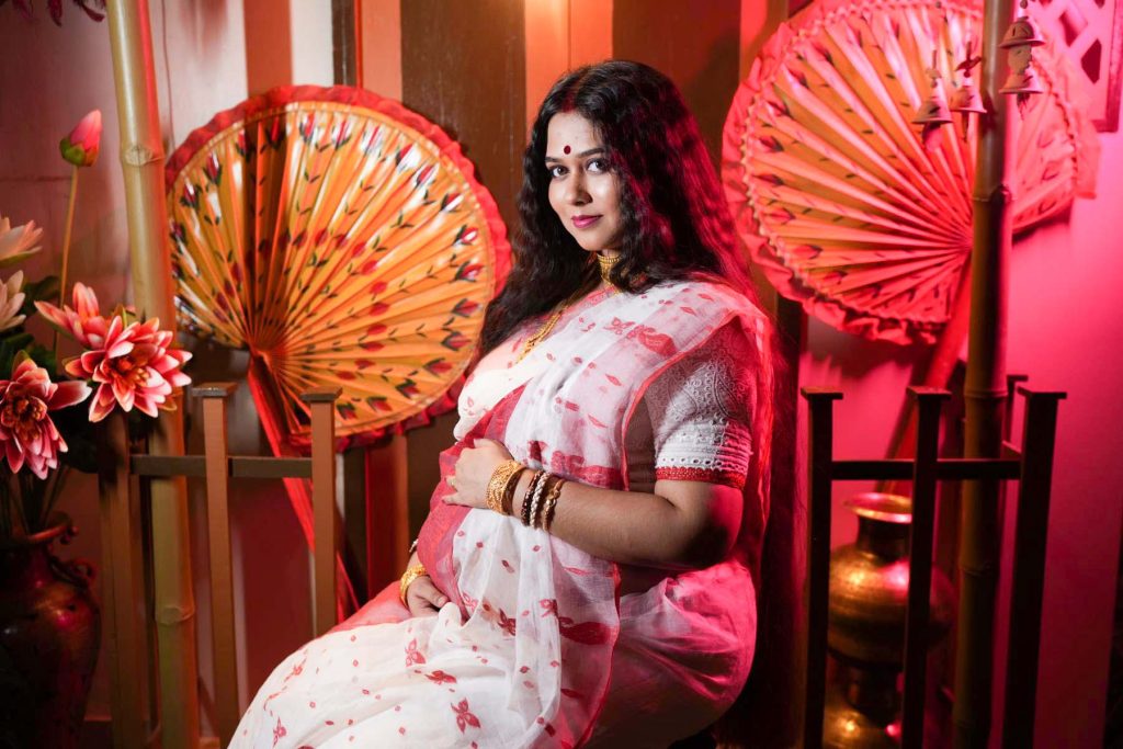Maternity photoshoot Kolkata with couple romantic pose
